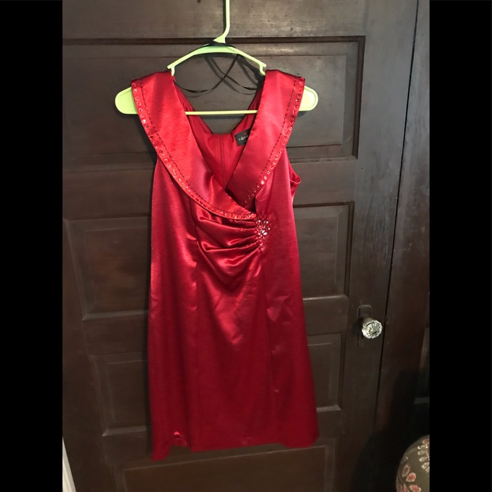 Beautiful, satin, red dress with beaded designs.